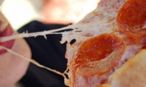 cheese pull pepperoni pizza